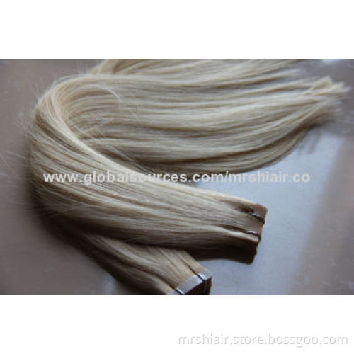 24-inch pale color Malaysian straight tape in hair